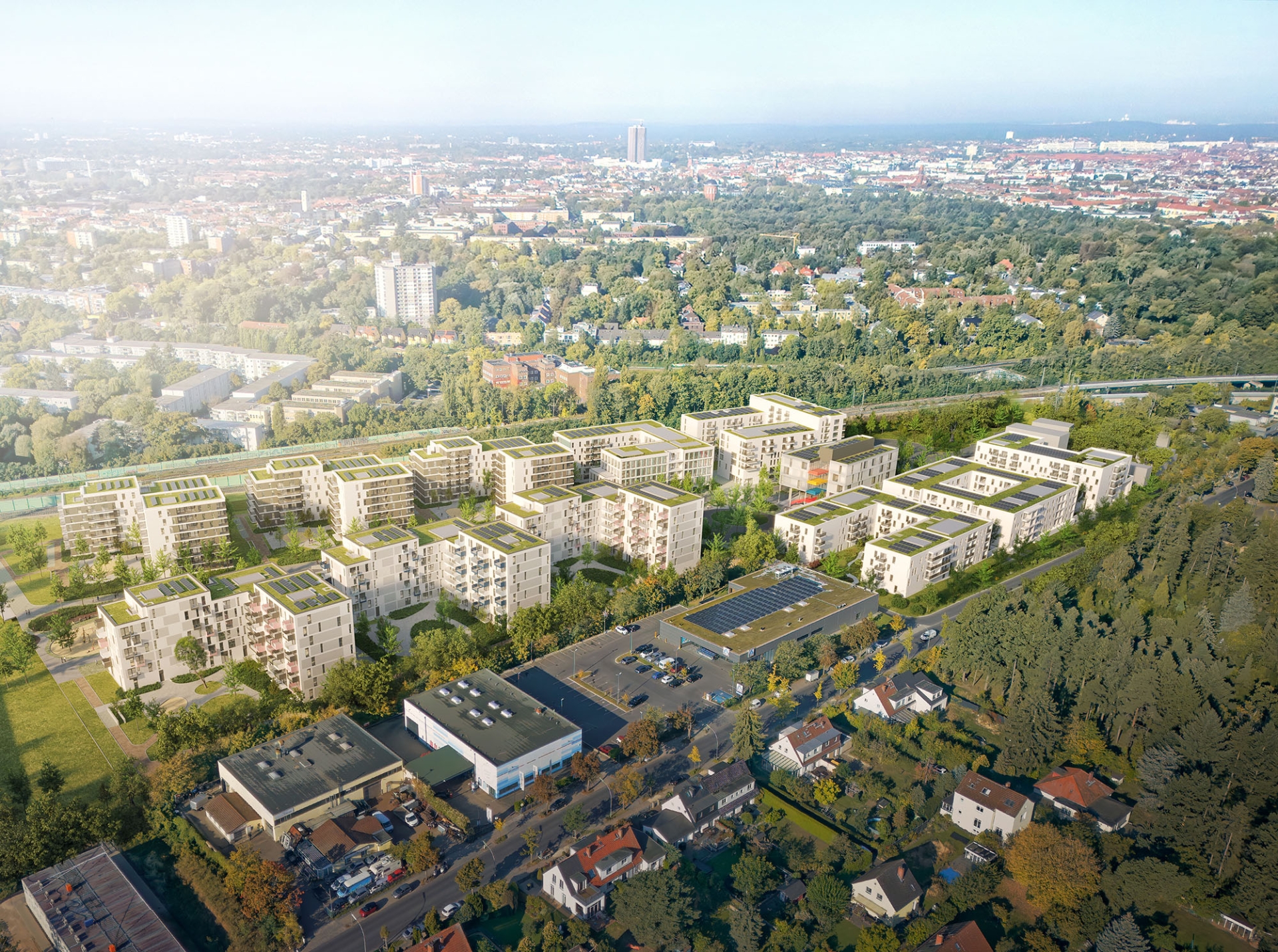 Luftbildvisualisierung der Marienhöfe in Berlin mit mehreren Wohngebäuden, begrünten Innenhöfen und Solaranlagen auf den Dächern. Wastebox organisiert die digitale Baustellenentsorgung für das Wohnbauprojekt mit rund 900 Wohnungen. © GOLDBECK GmbH